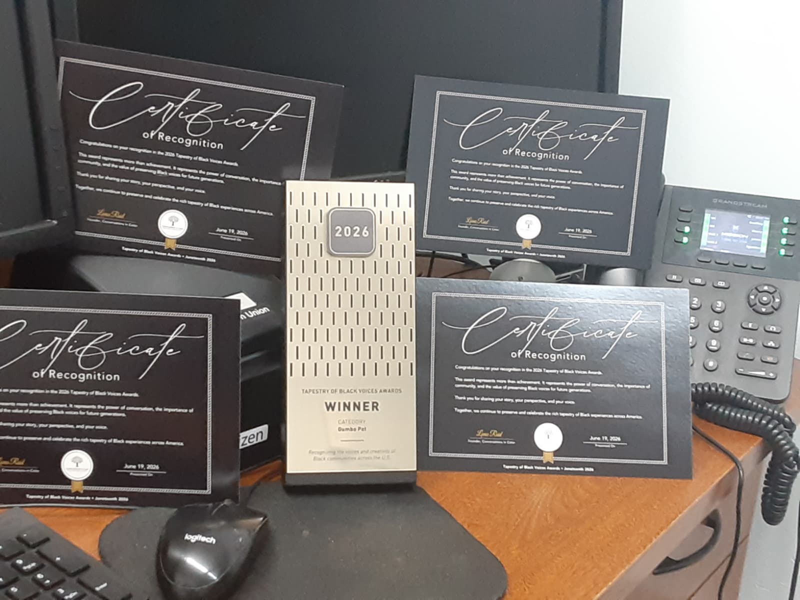 Tapestry of Black Voices award certificates and 2026 winner plaque